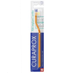 Зубная щетка Curaprox для имплантов брекетов и ортоконструкций оранжевая